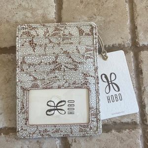 Hobo card holder. NWT “Botanical Beauty” pattern